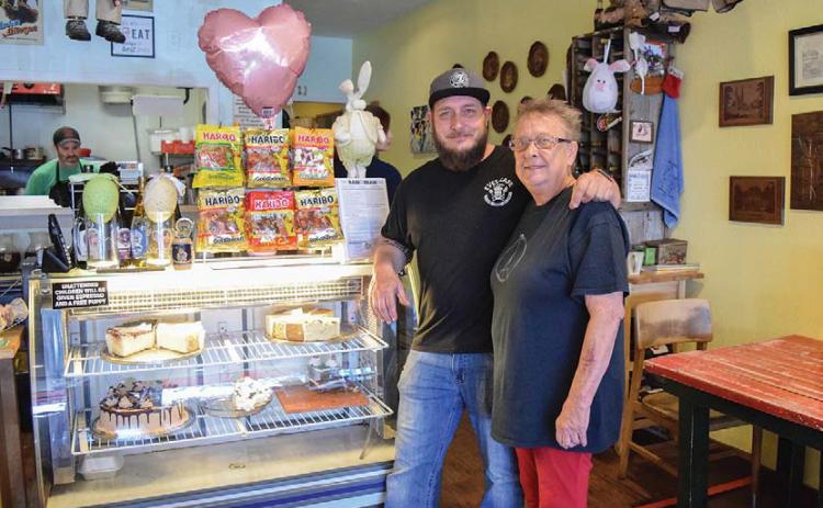 Eve Sanchez is shown with her son, Marc Clevenger, who helps run the restaurant on East Third Street. File photo