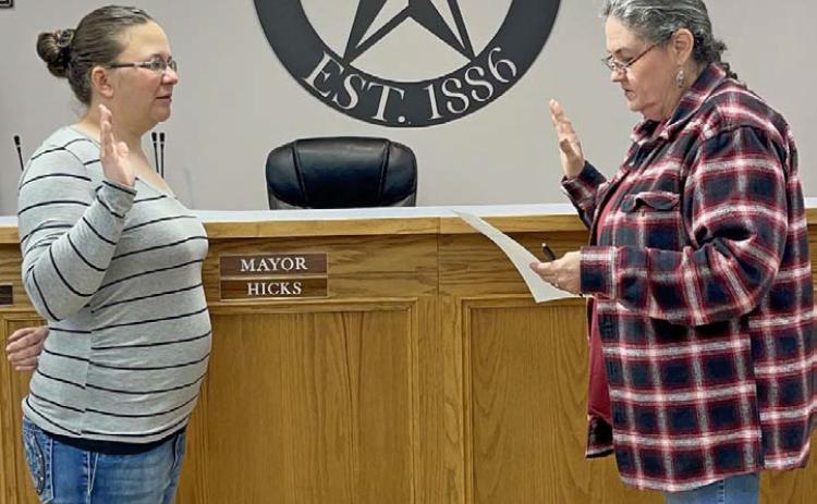 Elizabeth Lambert, left, was sworn in Monday as the new city secretary by Lometa Municipal Court Judge Sharon Watson. MASON HINES | DISPATCH RECORD