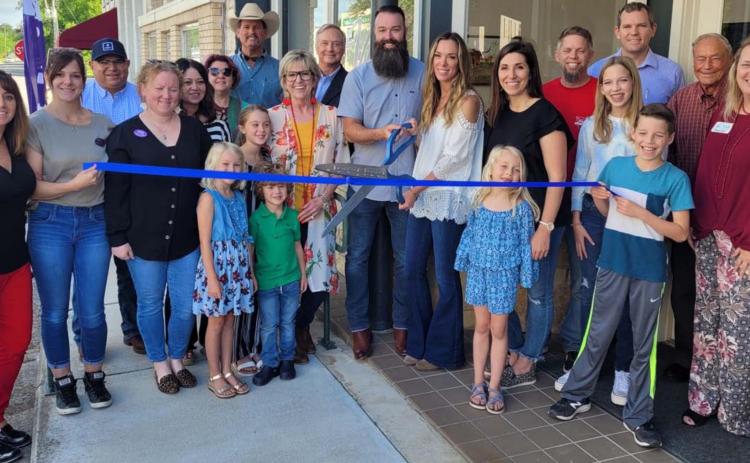 Downtown real estate office celebrates with a ribbon-cutting event