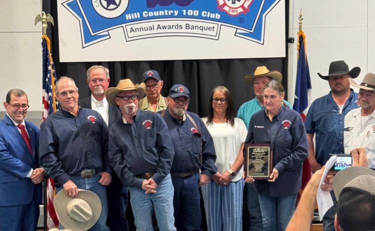 COURTESY PHOTO The Adamsville Volunteer Fire Department was honored by the Hill Country 100 Club for its actions on May 4-5, 2024 to keep area residents safe during widespread flooding when the Lampasas River left its banks. Pictured with the Adamsville VFD is State Sen. Pete Flores, at left.