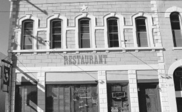 The Commercial Saloon was located in this building on East Third Street. File photo