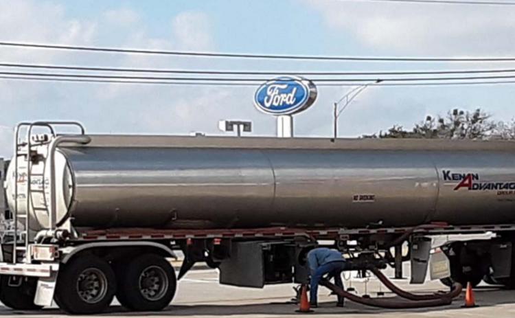A tanker fills fuel pumps at the Stripes station on North Key Avenue. JEFF LOWE | DISPATCH RECORD