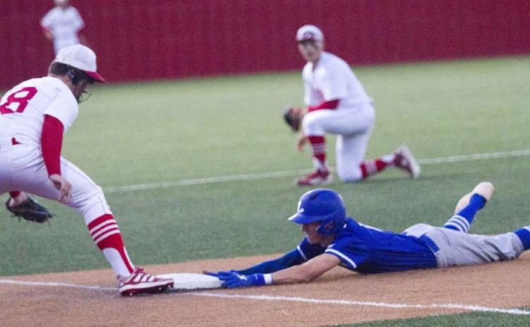 Logan Coleman slides safely into third on a triple to set up the Badgers’ first run at Glen Rose on Friday. JEFF LOWE | DISPATCH RECORD