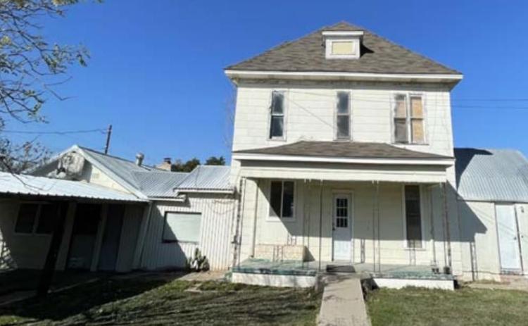 The Lometa Independent School District Board of Trustees approved a bid from a Liberty Hill contractor to remove asbestos and demolish an old house on the north end of the Lometa ISD property. MASON HINES | DISPATCH RECORD