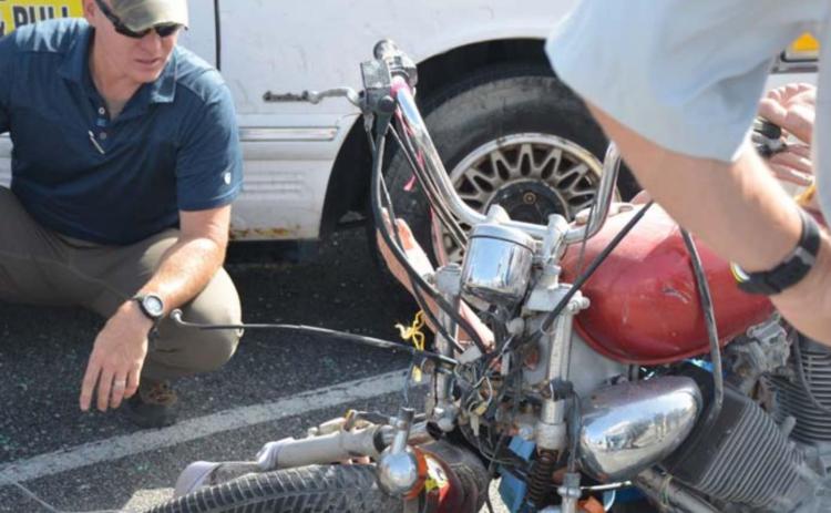 Boerne Highway Patrolman Robert Laferney investigates a simulated crash scene at a recent safety training event in Lampasas. MASON HINES | DISPATCH RECORD