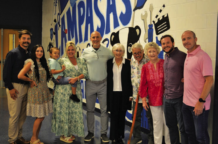 Assistant Superintendent Dana Holcomb, center, is surrounded by family members who were on hand at the Lampasas ISD end-of-year event to celebrate his service to the school district and his upcoming retirement. ERICK MITCHELL | DISPATCH RECORD