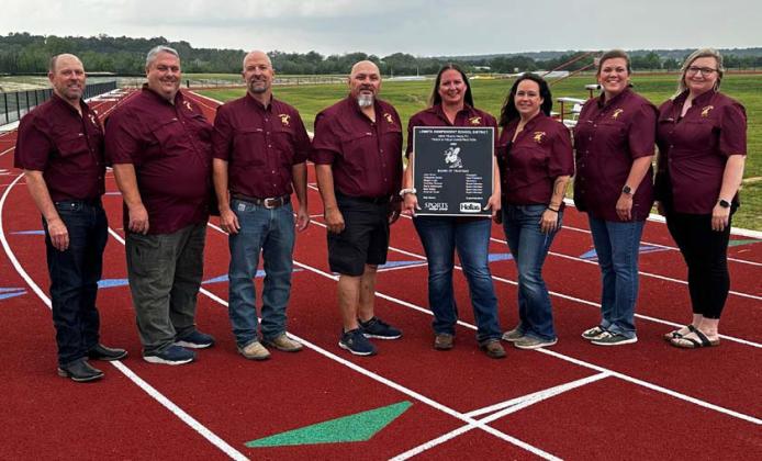 Celebrating the completion of the track facility at Lometa High School are, from left, Superintendent Rob Moore, and trustees John Hines, Matt Molter, Mario Maldonado, Amanda Tower, Megan Lusty, Cristopher Brister and Courtney Duncan. Courtesy photo