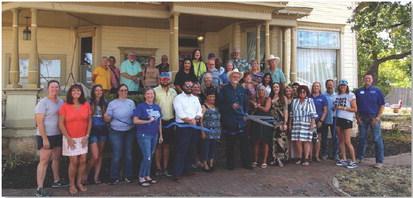 JOYCESARAH MCCABE | DISPATCH RECORD Eddie and Dale Shell are pictured here with friends and Lampasas County Chamber of Commerce members as they celebrate the Gillen House opening as a guest house.