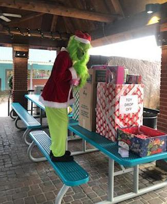 The Grinch also sneaked into the recent “Santa at Storm’s toy drive” event on Dec. 7 and attempted to make a getaway with the gifts. Unwrapped toys were collected for the Lampasas Fire Department’s annual distribution before Christmas. courtesy photo