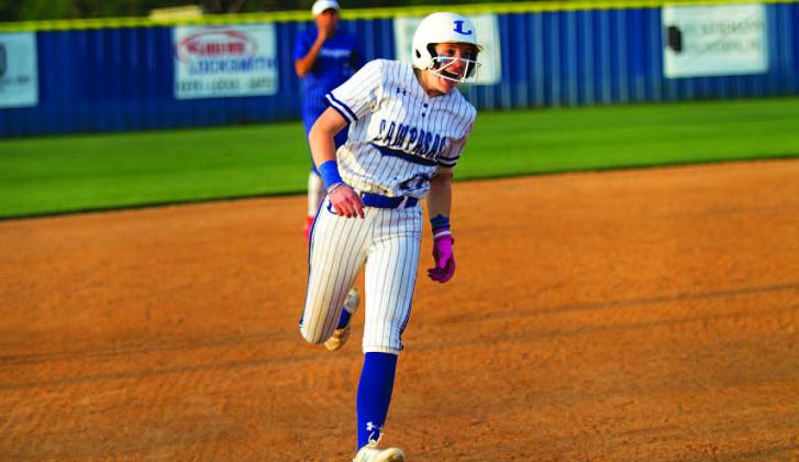 Aspen Wheeler heads home after hitting a grand slam on Senior Night that brought the game against Jarrell within one run Tuesday night. HUNTER KING | DISPATCH RECORD
