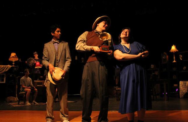In 2023, the Lampasas High School theater company put on “Failure: A Love Story.” James Vasquez, at left, playing the part of Mortimer Mortimer, is pictured with Luke Coonrod, playing the part of John N. Fail, and Ciara Carnes, playing the part of Nelly Fail, as they rehearse a scene in which Nelly is singing to the music of the gramophone and Mortimer gazes on, thinking Nelly is the most beautiful woman he’s ever seen. file photo