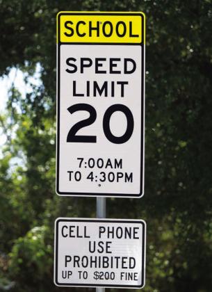 A sign outside a Lampasas ISD campus reminds drivers to slow when entering a designated school zone. Lampasas and Lometa ISD students returned to classes this week. HUNTER KING | DISPATCH RECORD