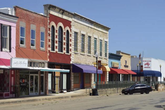 A number of downtown business sites sit vacant along East Third Street. Building owners are considering their options for attracting more visitors -- and potential customers -- to the area. DISPATCH RECORD