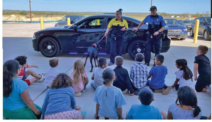 Lometa Police Chief Melissa Cantu and Police Officer Kenny Murray speak to Lometa fourthgraders during Career Day. mason hines | dispatch record