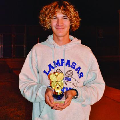 Luke Rogers holds his trophy after winning first place at the Georgetown tournament last week. COURTESY PHOTO | KENNETH PEISER