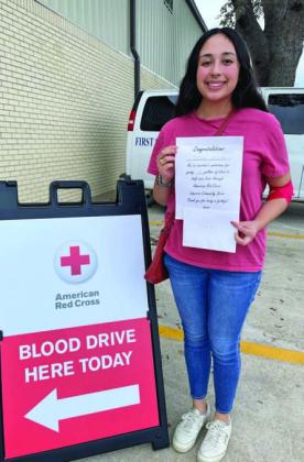 Julieta Munoz received a certificate recognizing her for reaching the blood donor milestone of 2 gallons. COURTESY PHOTO
