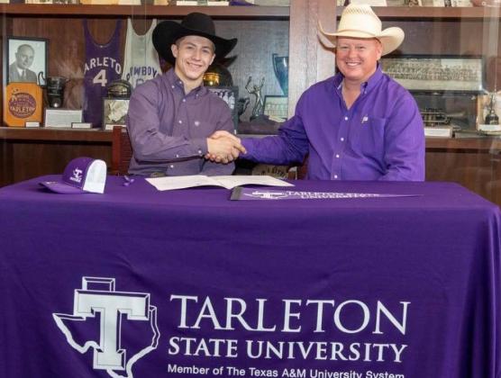 Kempner-area bull rider Riggen Hughes, left, signed with Tarleton State University’s rodeo program. He is shown with coach Mark Eakin. COURTESY PHOTO