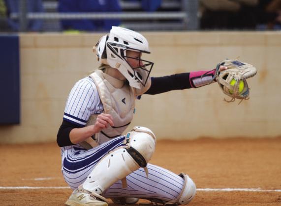 Kali Hunter frames a pitch during the Tuesday win over the Lago Vista Lady Vikings. HUNTER KING | DISPATCH RECORD