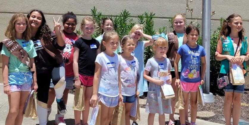 Pictured at the Lampasas Police Department building are, from left to right, Girl Scouts Jenna Paige Linney, Katelynn Rodriguez, Vera-Rose Johnson, Emerson Evans, Karma Driskell, Emma-Lee Bull, Fiona Wharton, Evelyn Peterson, Addison Hammons, Anna Figurski, Belle Wharton and Breanna Kirby. Not pictured: Jesseca Mahoney, Kayleigh Mahoney, Autumn Beavers and Gwen Carey. COURTESY PHOTO