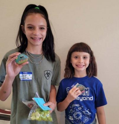 Showing their kindness rocks are Jesseca Mahoney and Kayleigh Mahoney. COURTESY PHOTO