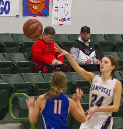 	Addison McDonald passes the ball in her last game with the Lady Badgers