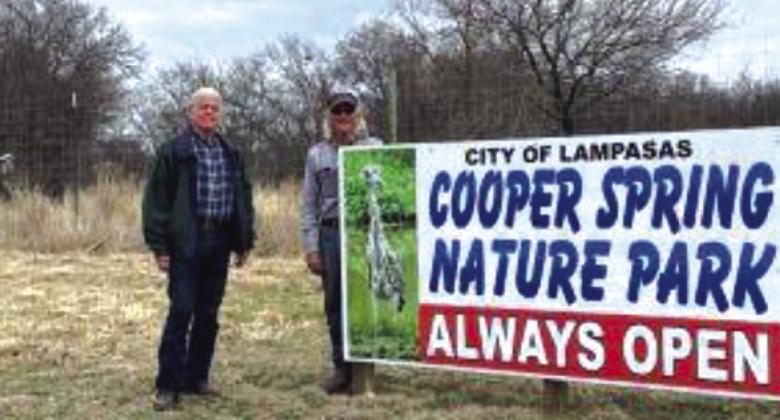 Paul Holland, at left, Hill Country SWCD technician, stands with Cooper Spring Nature Park board member Harrell Clary. The Soil &amp; Water Conservation District recently provided a pollinator wildflower seed mix for the park, and Clary worked to prepare soil beds for the mix. COURTESY PHOTO