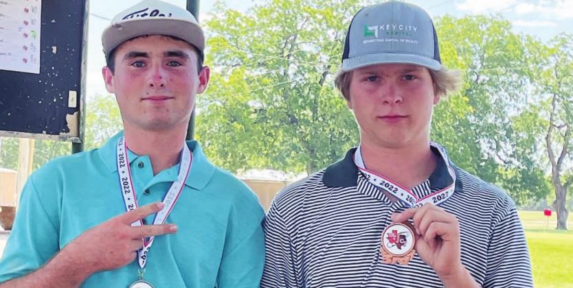Peyton Spore, left, and Nick Haas pose with their second-and third-place medals from the San Saba tournament. COURTESY PHOTO