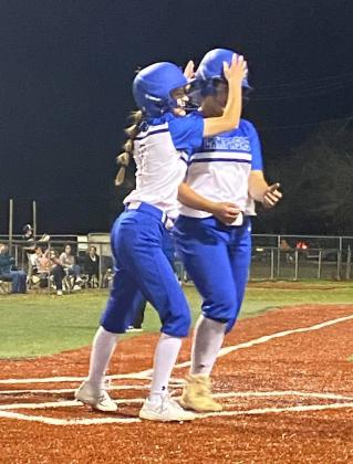 Kayli Syx, left, celebrates with Alycia Cantu after Cantu's two-run home run. (Courtesy photo)