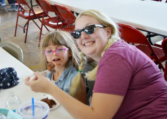 Kempner residents Malyssa Allen and her daughter Fionna enjoy dessert at the KVFD fundraiser. 