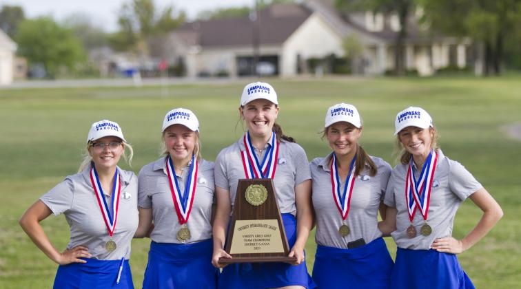 Lady Badger golfers Elizabeth Cross, LeeAnn Parker, Kinsley Lindeman, Shaylee Wolfe and Kylee Rutledge show the first-place team plaque they earned on April 5 and April 12 in a 36-hole district tournament. 