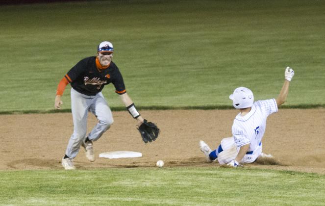 Dax Brookreson slides safely into second base in the Badgers' playoff series against Burkburnett. 