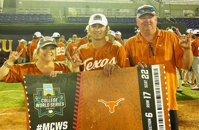Kenna Whitehead, left, Ace and his dad Kirk Whitehead hold the Longhorns ticket to Omaha after the game three victory. COURTESY PHOTO