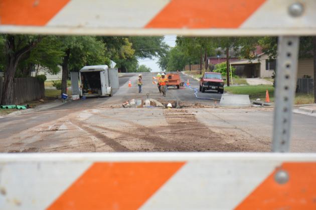 Public works employees were seen working on West Avenue C in Lampasas Tuesday morning. MONIQUE BRAND | DISPATCH RECORD