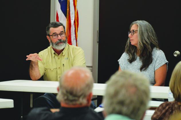 Hico City Administrator Jason Dominy, left, and City Secretary/ Executive EDC Director Jennifer Wuemling discuss the city's rousing downtown development with Forward Lampasas members on Friday. ERICK MITCHELL | DISPATCH RECORD