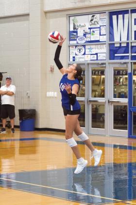 Ysabella Swain rises up for a serve in a match earlier this season. Swain’s senior leadership in the middle continues to be a boon for the Lady Badgers as the season goes on. ERICK MITCHELL | DISPATCH RECORD