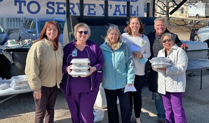 A drive-through Lampasas First Responders Appreciation Lunch, hosted by the Benny Boyd auto dealership, took place Jan. 25. Pictured here with staff from AdventHealth Rollins Brook are chamber member Teresa Thornton, far left, and Jamie Erickson, back right, who was responsible for coordinating the lunch. courtesy photo