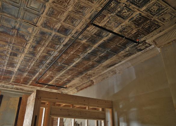 ERICK MITCHELL | DISPATCH RECORD The pressed tin ceiling inside the building at 511 E. Third St. convinced Austin native Myra Barlin to purchase and renovate the structure on the Lampasas courthouse square. See related, photo p. 10.
