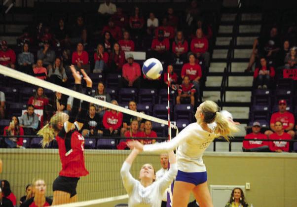 Pelbath goes up for a kill off the Dowdy set. HUNTER KING | DISPATCH RECORD