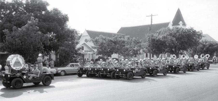 This 1960s-era Key Avenue parade included the 1st Armored Division Band riding in Jeeps, headed south on Key Avenue in front of what would become HEB grocery store. Horace Sargent’s real estate office and the Methodist Church can be seen in the background. lampasas dispatch file photo | jeff Jackson collection