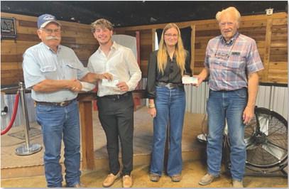 courtesy photo Lampasas Pilots Association offered its first scholarship awards at a recent meeting. Pictured, left to right, are pilots association member Rusty Knox, scholarship co-recipients Koh Stapp and Delanie Smith, and pilots association member Gordon Thornton.
