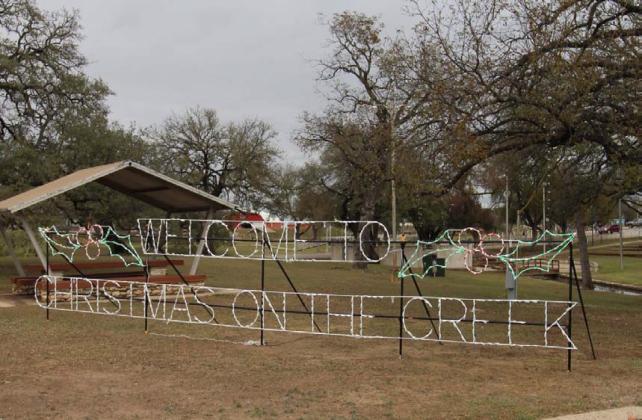 The city parks department quickly repaired the electrical damage done to the Welcome To Christmas On The Creek sign. JOYCESARAH MCCABE | DISPATCH RECORD