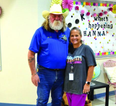 Guy Niles of Saratoga Lodge #546 is shown with Hanna Springs Elementary School nurse Tobi King. The Masonic Charities Program visits local elementary campuses annually to offer dental kits to young students. COURTESY PHOTO