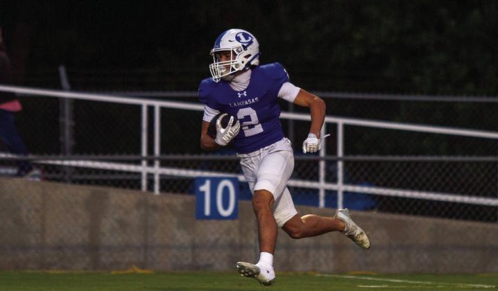 Senior Jonathan Bowling returns a kickoff against Jarrell last week. Bowling rushed for a total of 87 yards. PHOTO BY ANA SOFIA MEYER | DISPATCH RECORD
