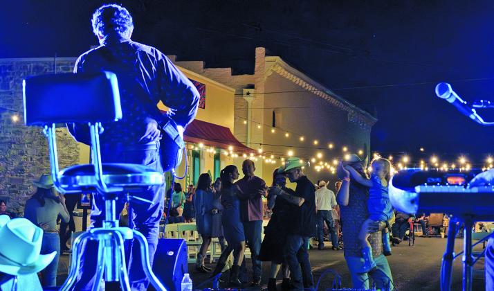 Attendees at the Lampasas County Museum’s Western on Westerm Street Dance enjoy time on the dance floor during Saturday’s event. ADAM BARRIOS | DISPATCH RECORD