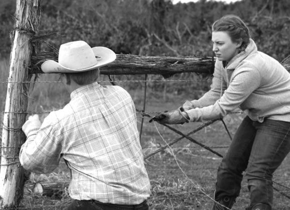 Joycesarah mccabe | dispatch record This young couple, Dylan and J’Lee Perryman, string a new barbed-wire fence. Ranching as a business is a full-time job that often requires every member of the family pitch in to help.