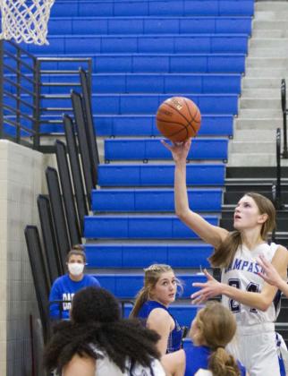 Addison McDonald shoots over several defenders. Listed at 6’0”, McDonald is part of the tallest line-up coach Mark Myers has had in four seasons in Lampasas. JEFF LOWE | DISPATCH RECORD