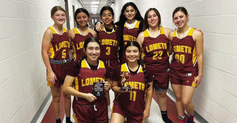 COURTESY PHOTO | FRANK REYES III The Lometa girls pose with their consolation trophy from the Zephyr tournament.