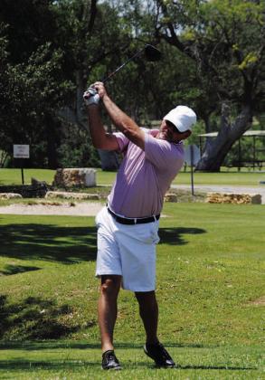 FILE PHOTO Mike White tees off at last year’s tournament.