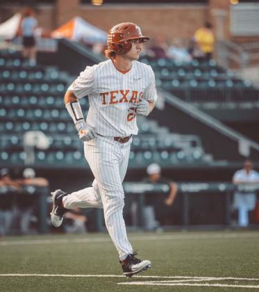 Ace Whitehead walks down to first base last Sunday after drawing a walk in one of his at-bats during the first fall scrimmage for the Longhorns. COURTESY PHOTO