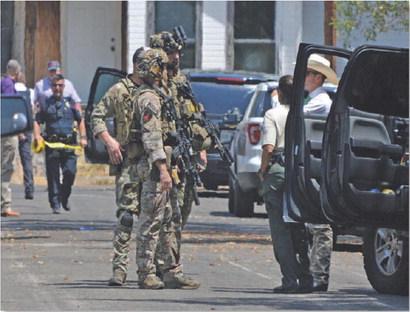 A SWAT team sent by Texas DPS emerged from a Cameron Drive residence Thursday afternoon to confirm that retired Lampasas County sheriff Gordon Morris was deceased from what authorities have stated appears to be a self-inflicted gun shot. ERICK MITCHELL | DISPATCH RECORD